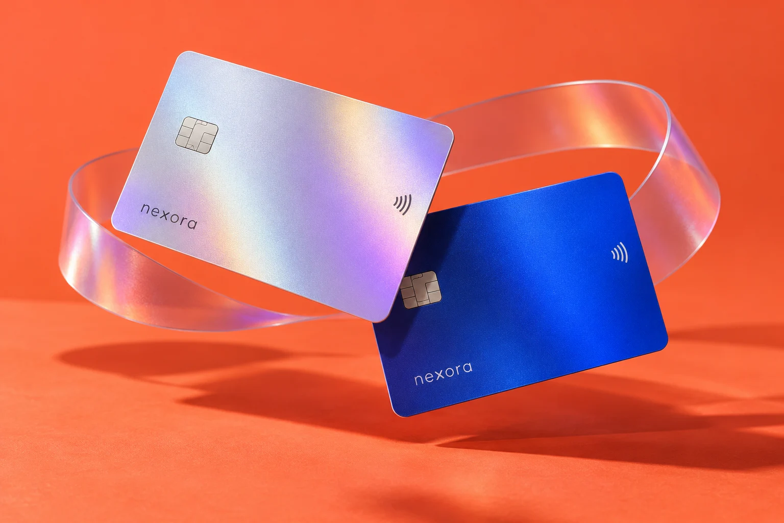 Nexora silver and blue card concepts on an orange background